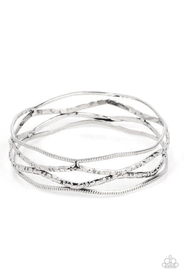 A Narrow ESCAPADE Silver Bangle