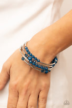 Load image into Gallery viewer, Whimsically Whirly Blue Coil Bracelet