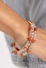 Load image into Gallery viewer, Notoriously Nuanced Orange Coil Bracelet