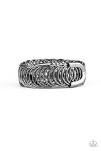 Load image into Gallery viewer, Dizzyingly Demure Black Coil Bracelet